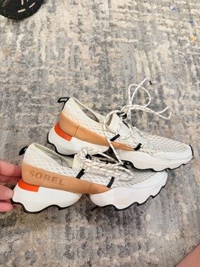 Sorel Women's Cream and Tan Athletic Sneakers with Orange Accent